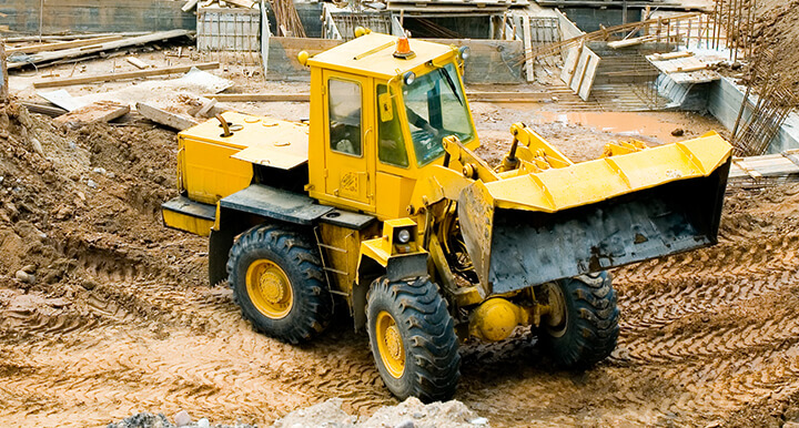 Frontend Loader being used for demolition for the purpose of Site Preparation
